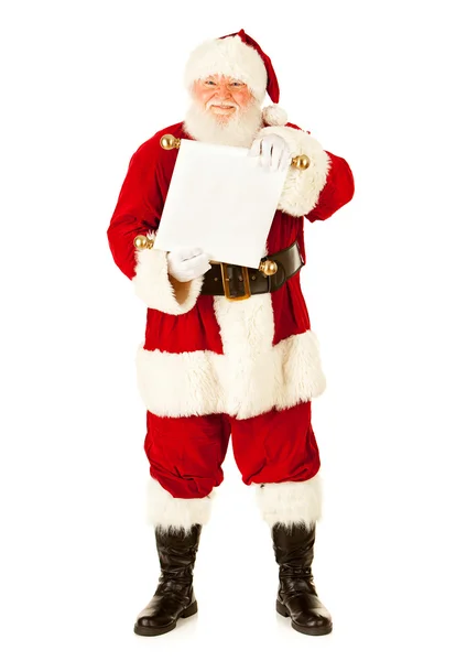 Санта-Клаус держит свиток рождественского списка — стоковое фото