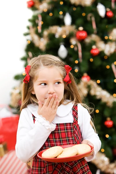 Jul: Liten flicka vill äta Tomtens Cookies — Stockfoto