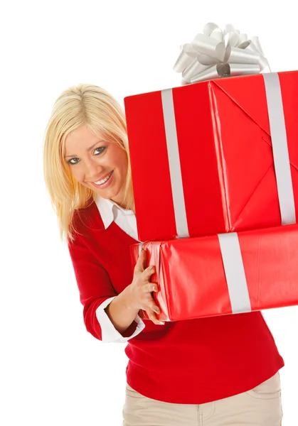 Weihnachten: Frau hält Stapel verpackter Weihnachtsgeschenke hoch — Stockfoto