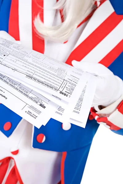 Estados Unidos: Tío Sam anónimo en posesión de formularios fiscales — Foto de Stock