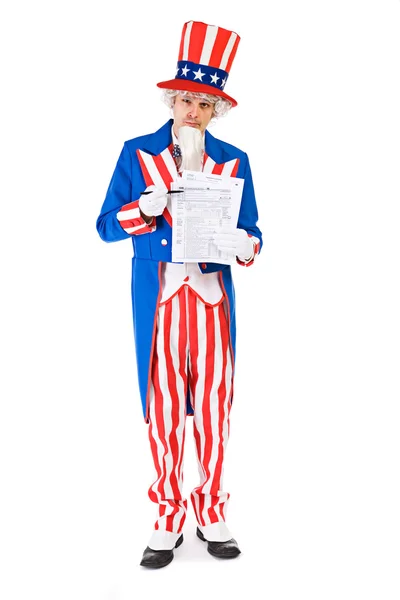 USA: Uncle Sam Stands with United States Tax Forms — Stock Photo, Image