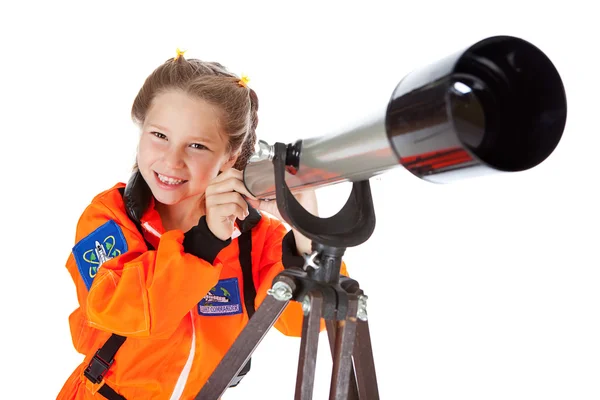 Astronaut: Kijken door een telescoop — Stockfoto