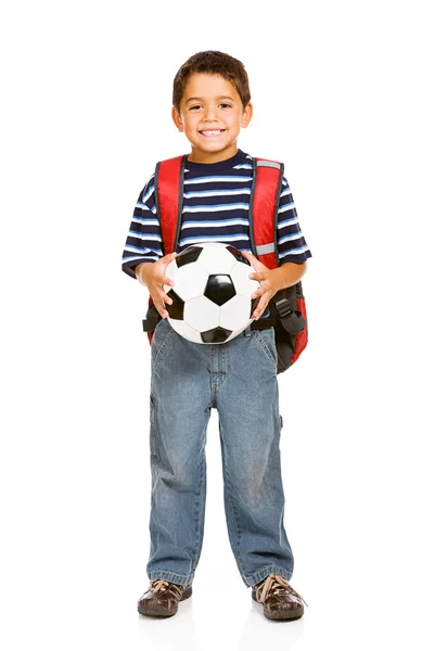 学生: 男孩抱着足球球 图库图片