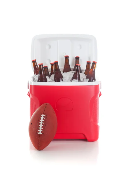 Football: Ball Leans Against Cooler Full Of Beer Stock Image