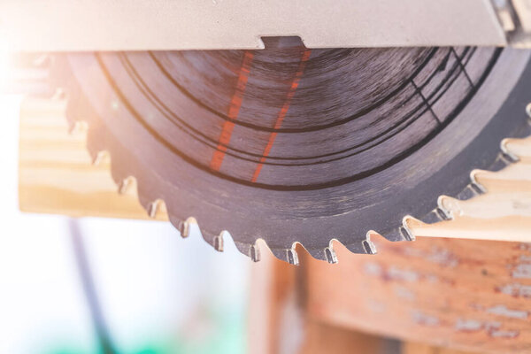 Close up of circular metal saw blade on construction site