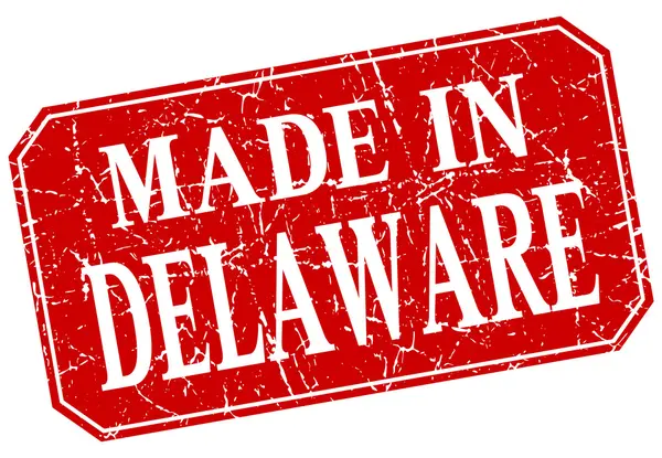 Made in Delaware red square grunge stamp — Stock Vector