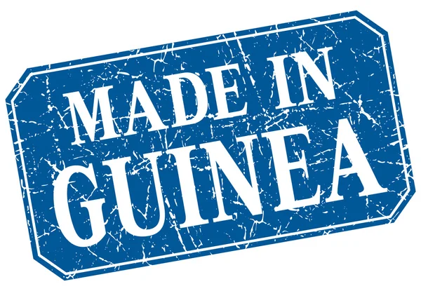 Зроблено в Гвінеї синій гранж квадратний штамп — стоковий вектор