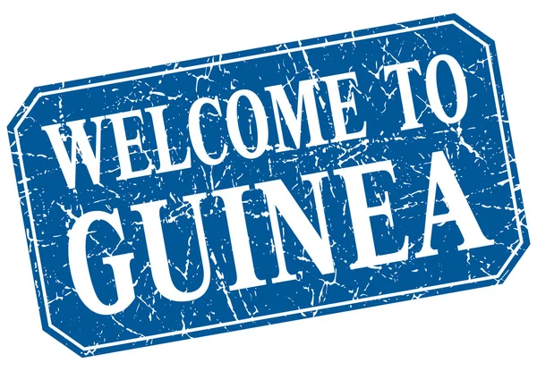 Benvenuto in Guinea francobollo grunge quadrato blu — Vettoriale Stock