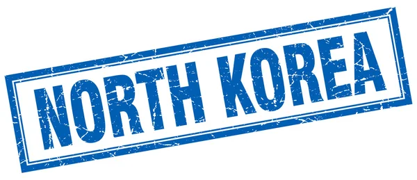 Corea del Nord blu quadrata grunge timbro su bianco — Vettoriale Stock