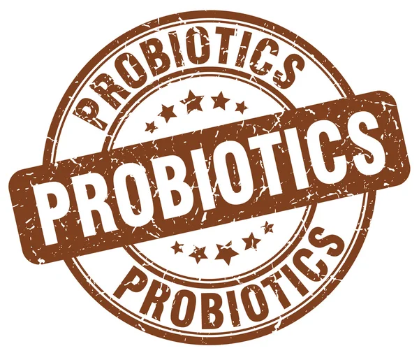 Probiotikumok barna grunge kerek vintage gumibélyegző — Stock Vector