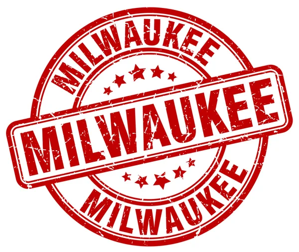 Milwaukee red grunge round vintage rubber stamp.milwaukee stamp.milwaukee round stamp.milwaukee grunge stamp.milwaukee vintage stamp. — Stockvektor