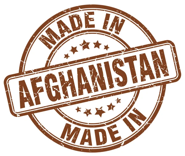 Fabriqué en Afghanistan timbre rond marron grunge — Image vectorielle