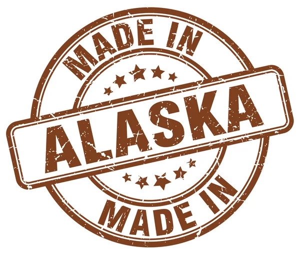 Hergestellt in alaska brown grunge round stamp — Stockvektor