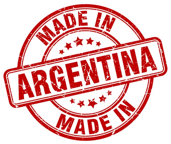Vyrobené v Argentině červené grunge kulaté razítko — Stockový vektor