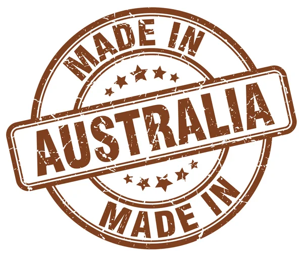 Made in Australia brown grunge round stamp — Stock Vector