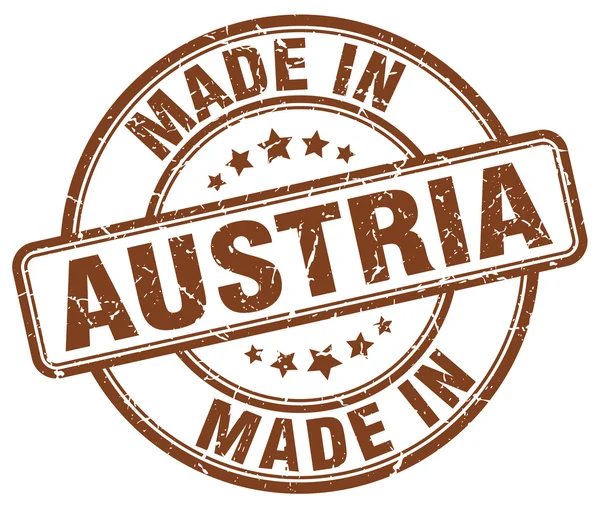 Made in Austria brown grunge round stamp — Stockvector