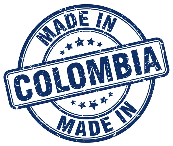 Hecho en Colombia grunge azul redondo sello — Archivo Imágenes Vectoriales