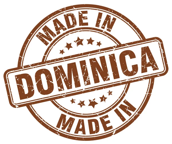Wykonane w Dominice brązowy grunge okrągły znaczek — Wektor stockowy