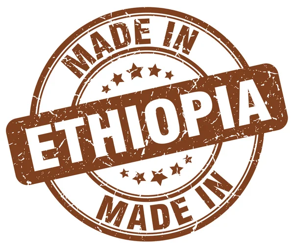 Gjort i Etiopien brun grunge rund stämpel — Stock vektor