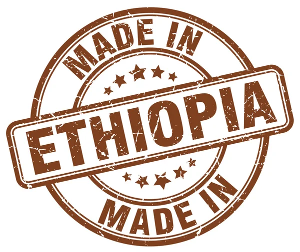 Made in Ethiopia brown grunge round stamp — Stok Vektör