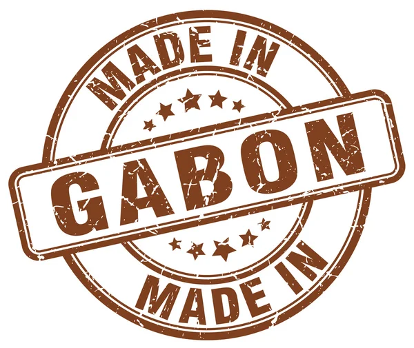 Made in Gabon brown grunge round stamp — Stock Vector