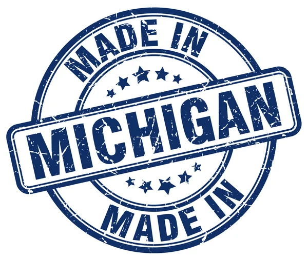 Fabriqué au Michigan timbre rond grunge bleu — Image vectorielle