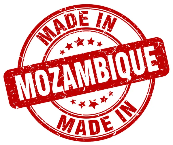 Hergestellt in mozambique red grunge round stamp — Stockvektor