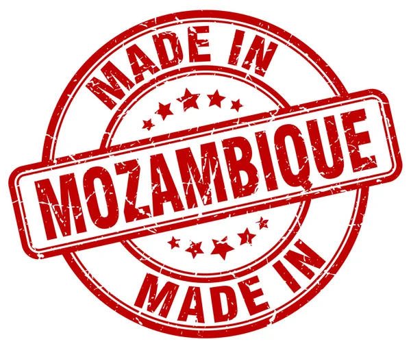Gjort i Moçambique röda grunge rund stämpel — Stock vektor