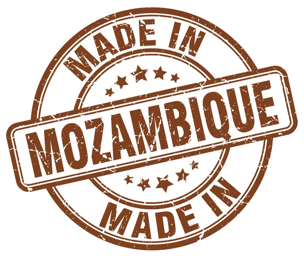 Hergestellt in mozambique brauner Grunge Rundstempel — Stockvektor