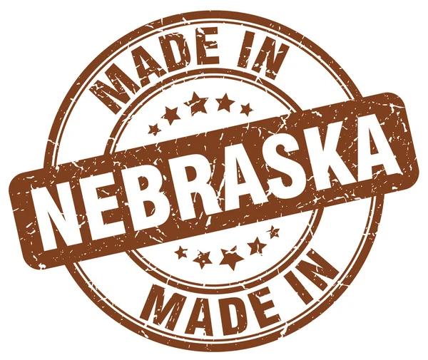 Fabriqué en timbre rond Grunge marron Nebraska — Image vectorielle