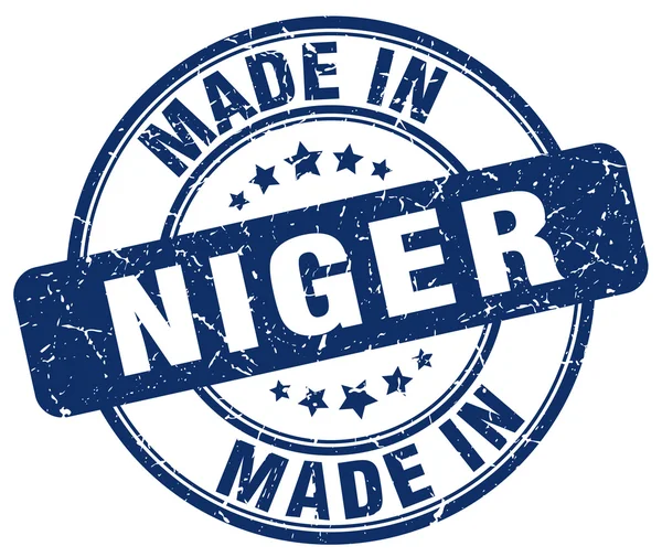Wykonane w Nigrze niebieski nieczysty okrągły znaczek — Wektor stockowy