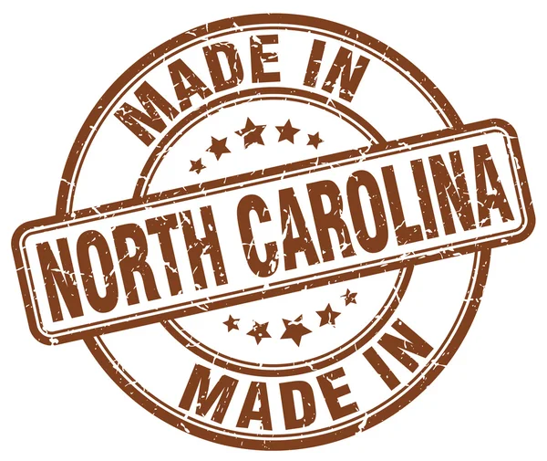 Wykonane w North Carolina brązowy nieczysty okrągły znaczek — Wektor stockowy