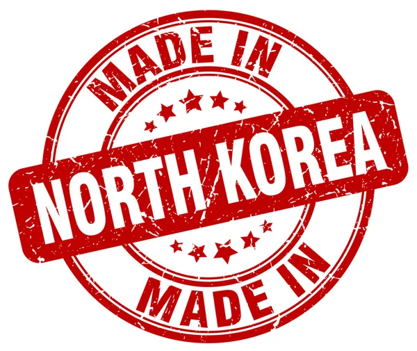 Made in North Korea red grunge round stamp — Stockvektor