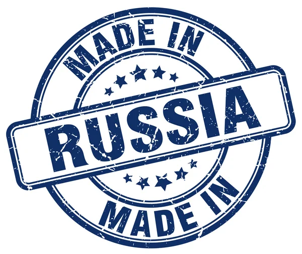 Maakte in Rusland blauwe grunge ronde stempel — Stockvector