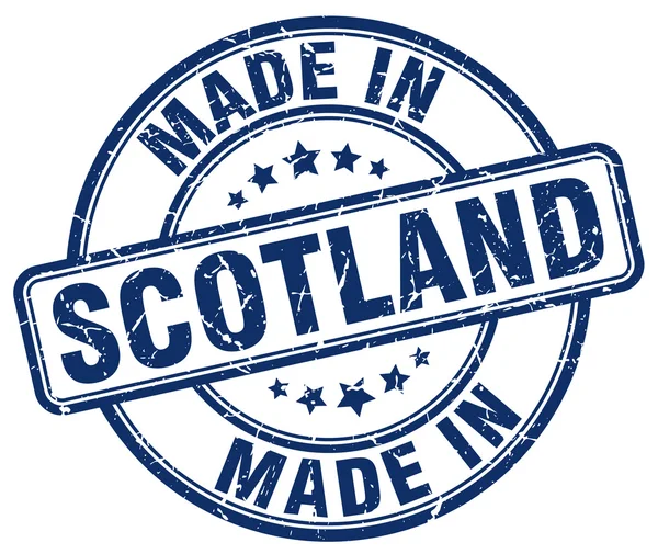 Maakte in Schotland blauwe grunge ronde stempel — Stockvector