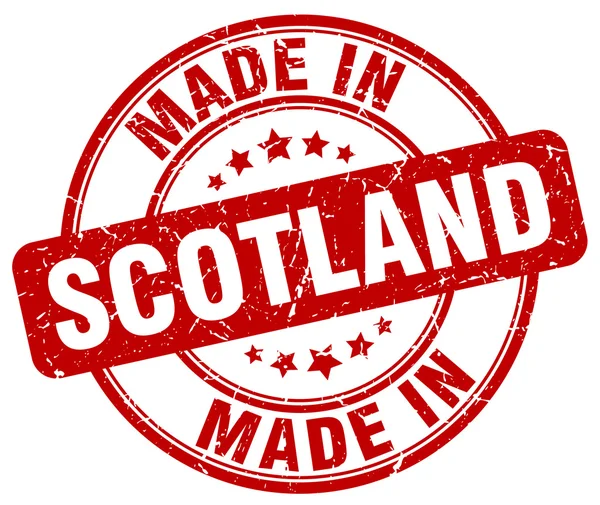 Made in Scotland francobollo rotondo grunge rosso — Vettoriale Stock