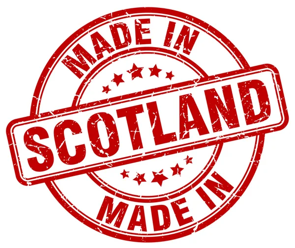 Maakte in Schotland rode grunge ronde stempel — Stockvector