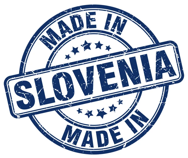 Made in Slovenia blue grunge round stamp — Stock Vector