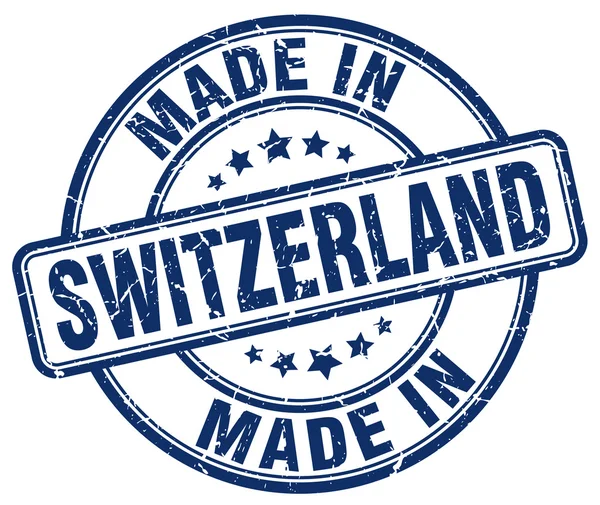 Fabriqué en Suisse timbre rond Grunge bleu — Image vectorielle