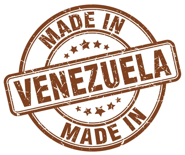 Made in Venezuela brown grunge round stamp — Stock Vector