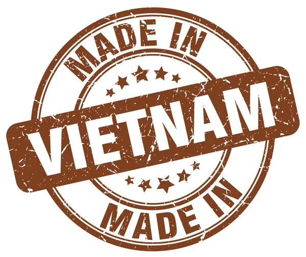 Maakte in Vietnam bruin grunge ronde stempel — Stockvector