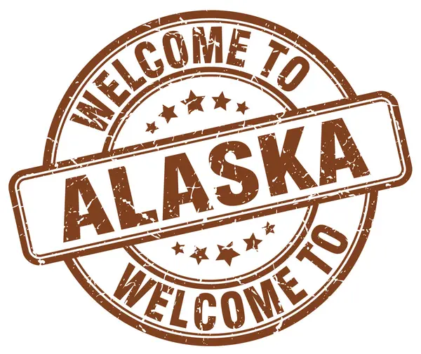 Benvenuto in Alaska marrone rotondo timbro vintage — Vettoriale Stock