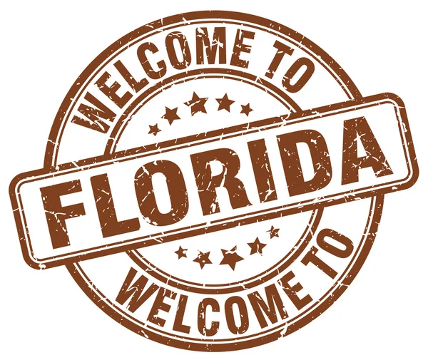 Vítejte na Floridu hnědé kulaté razítko vintage — Stockový vektor