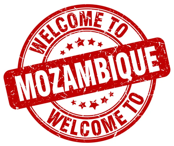 Benvenuto a Mozambico rosso rotondo timbro vintage — Vettoriale Stock