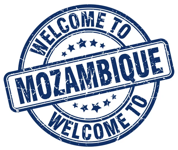Benvenuto a Mozambico blu rotondo timbro vintage — Vettoriale Stock