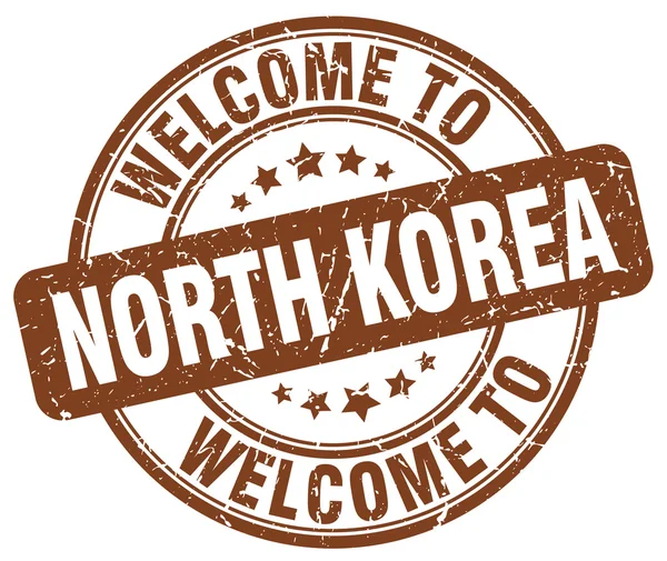 Welcome to North Korea brown round vintage stamp — Stock Vector