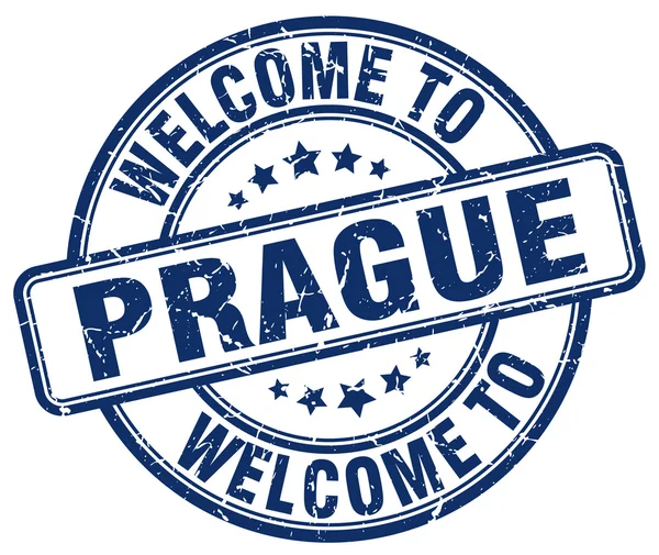 Benvenuto a Praga blu rotondo timbro vintage — Vettoriale Stock