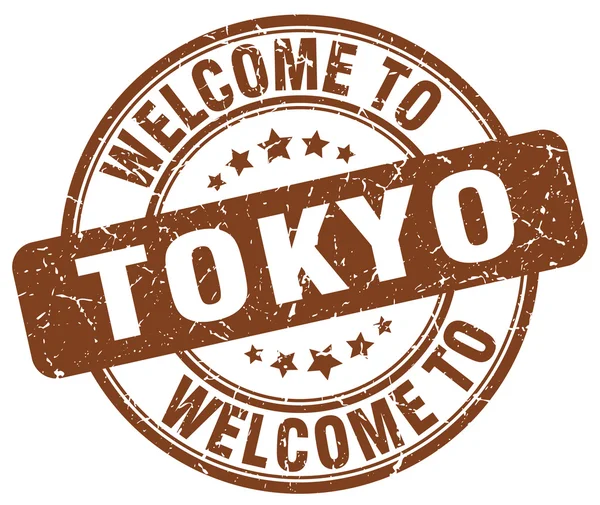 Welcome to Tokyo brown round vintage stamp — Stock Vector