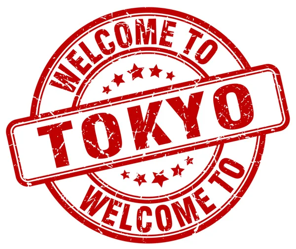 Willkommen zu Tokyo roter runder Vintage-Briefmarke — Stockvektor
