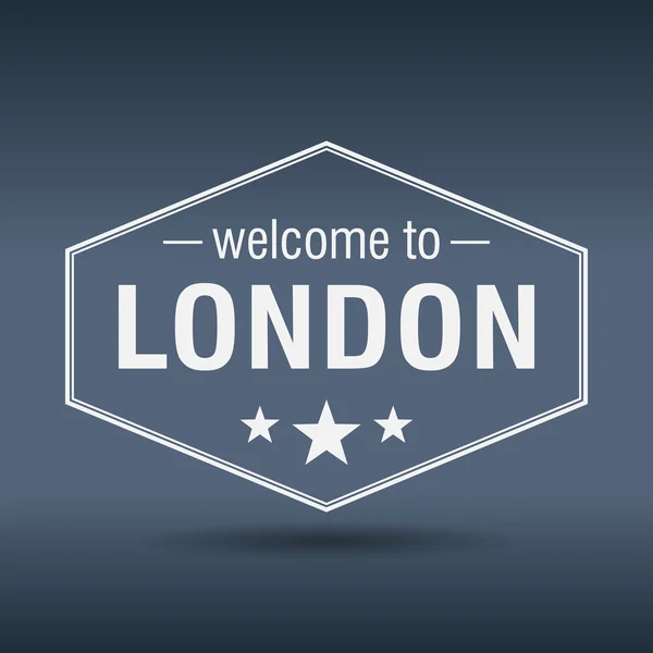 Вітаємо у Лондоні на шестикутному білому вінтажному лейблі — стоковий вектор